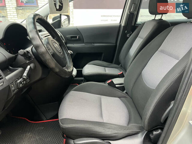 Бежевый Мазда 5, объемом двигателя 1.8 л и пробегом 286 тыс. км за 5200 $, фото 12 на Automoto.ua