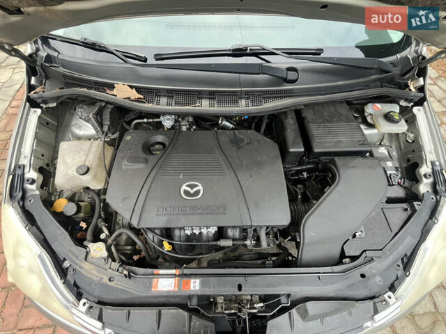 Бежевый Мазда 5, объемом двигателя 1.8 л и пробегом 286 тыс. км за 5200 $, фото 21 на Automoto.ua