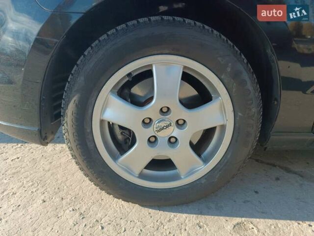 Черный Мазда 5, объемом двигателя 2 л и пробегом 218 тыс. км за 5200 $, фото 19 на Automoto.ua