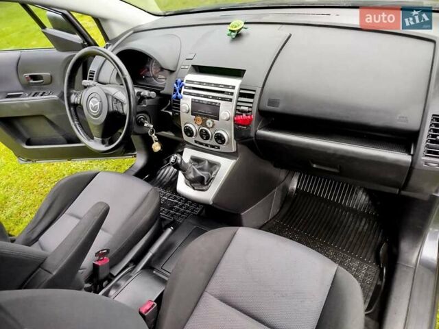 Чорний Мазда 5, об'ємом двигуна 2 л та пробігом 188 тис. км за 3950 $, фото 19 на Automoto.ua