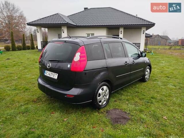 Чорний Мазда 5, об'ємом двигуна 2 л та пробігом 188 тис. км за 3950 $, фото 4 на Automoto.ua