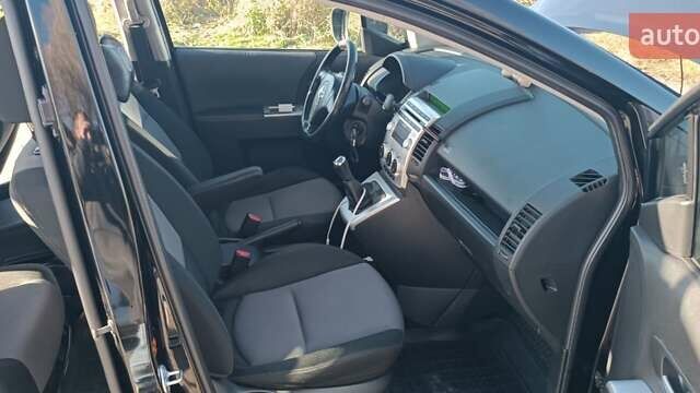 Черный Мазда 5, объемом двигателя 2 л и пробегом 218 тыс. км за 5200 $, фото 24 на Automoto.ua