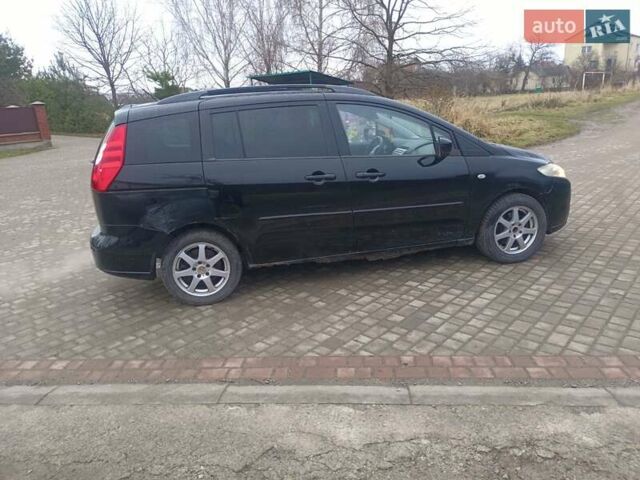 Черный Мазда 5, объемом двигателя 1.8 л и пробегом 255 тыс. км за 2500 $, фото 12 на Automoto.ua