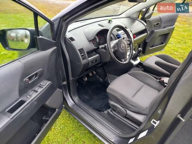 Чорний Мазда 5, об'ємом двигуна 2 л та пробігом 188 тис. км за 3950 $, фото 17 на Automoto.ua