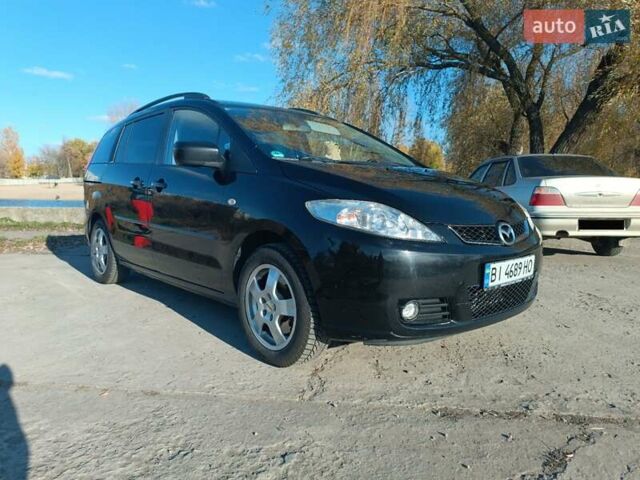 Черный Мазда 5, объемом двигателя 2 л и пробегом 218 тыс. км за 5200 $, фото 11 на Automoto.ua