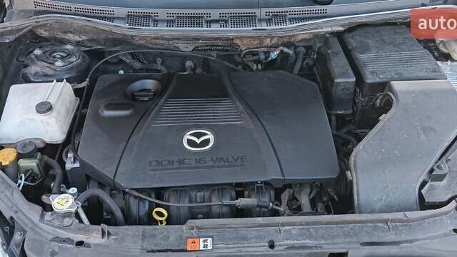 Черный Мазда 5, объемом двигателя 2 л и пробегом 218 тыс. км за 5200 $, фото 4 на Automoto.ua