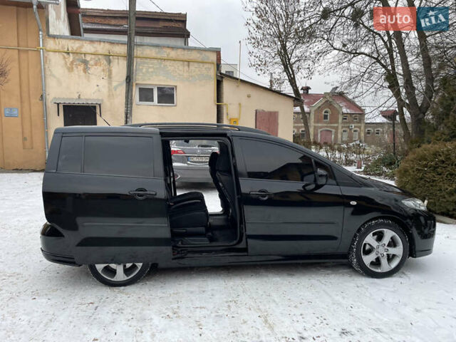 Черный Мазда 5, объемом двигателя 2 л и пробегом 325 тыс. км за 4800 $, фото 18 на Automoto.ua