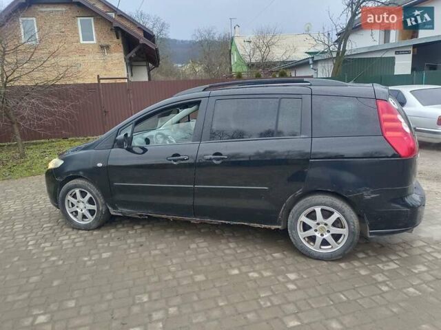 Черный Мазда 5, объемом двигателя 1.8 л и пробегом 255 тыс. км за 2500 $, фото 8 на Automoto.ua