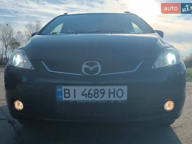 Черный Мазда 5, объемом двигателя 2 л и пробегом 218 тыс. км за 5200 $, фото 5 на Automoto.ua