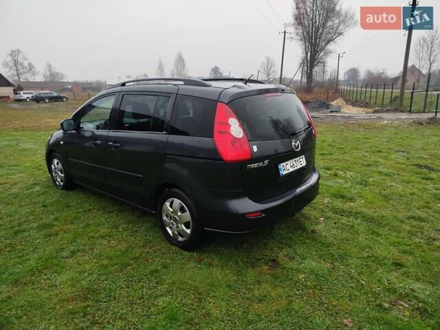 Чорний Мазда 5, об'ємом двигуна 2 л та пробігом 188 тис. км за 3950 $, фото 7 на Automoto.ua
