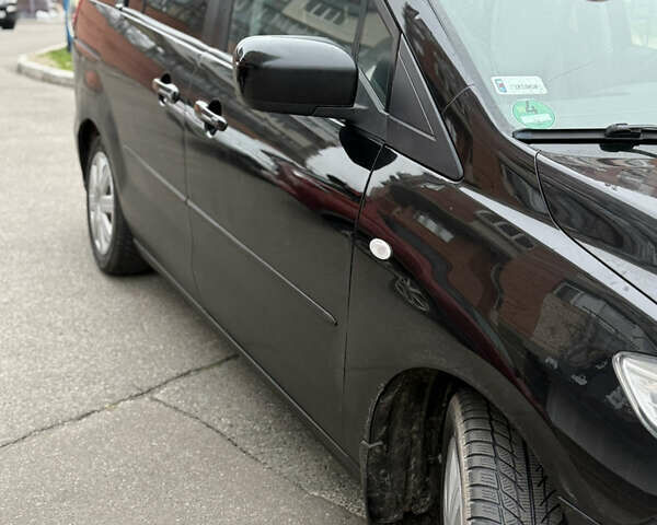 Черный Мазда 5, объемом двигателя 2 л и пробегом 280 тыс. км за 2700 $, фото 3 на Automoto.ua