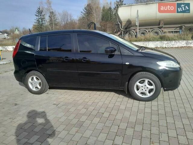 Чорний Мазда 5, об'ємом двигуна 1.8 л та пробігом 245 тис. км за 4650 $, фото 4 на Automoto.ua