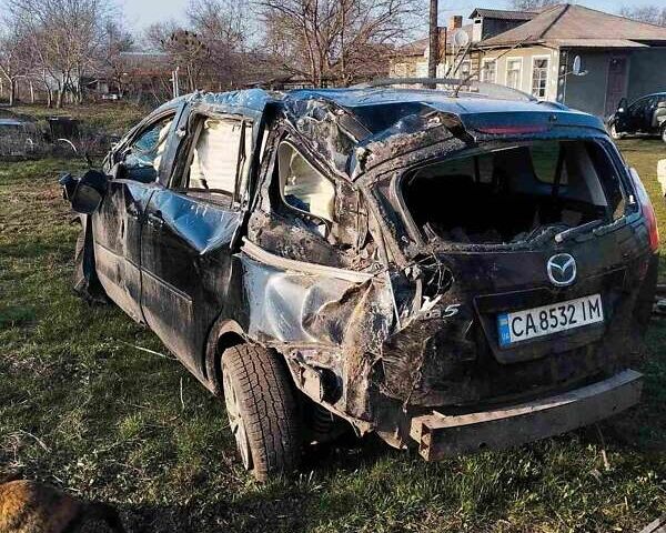 Чорний Мазда 5, об'ємом двигуна 2 л та пробігом 230 тис. км за 740 $, фото 2 на Automoto.ua