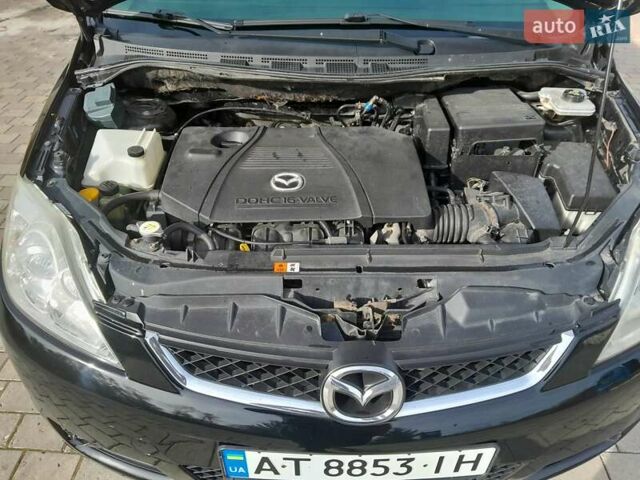 Черный Мазда 5, объемом двигателя 1.8 л и пробегом 243 тыс. км за 5300 $, фото 4 на Automoto.ua
