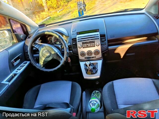 Черный Мазда 5, объемом двигателя 2 л и пробегом 280 тыс. км за 4200 $, фото 5 на Automoto.ua