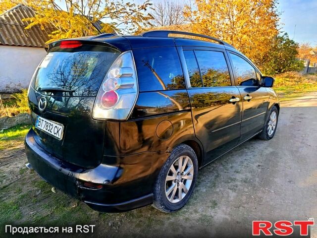 Черный Мазда 5, объемом двигателя 2 л и пробегом 280 тыс. км за 4200 $, фото 1 на Automoto.ua