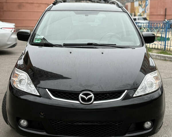 Черный Мазда 5, объемом двигателя 2 л и пробегом 280 тыс. км за 2700 $, фото 1 на Automoto.ua