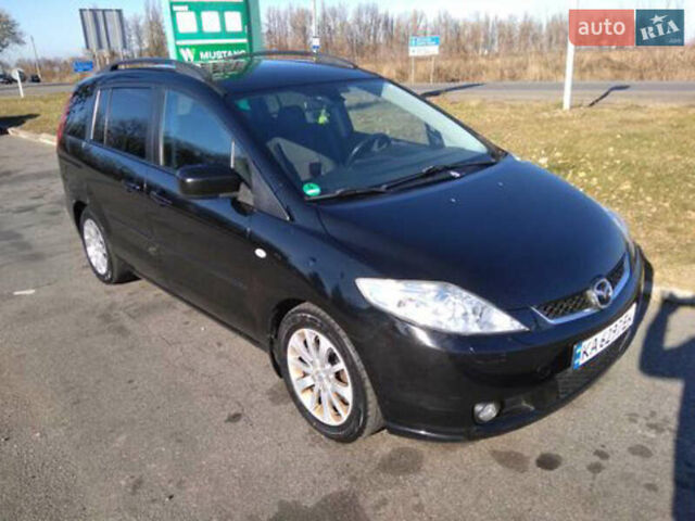 Черный Мазда 5, объемом двигателя 2 л и пробегом 318 тыс. км за 6300 $, фото 1 на Automoto.ua
