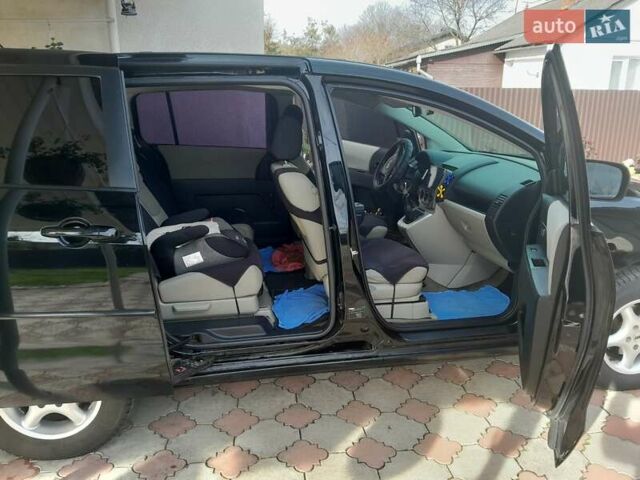 Чорний Мазда 5, об'ємом двигуна 1.8 л та пробігом 245 тис. км за 4650 $, фото 7 на Automoto.ua