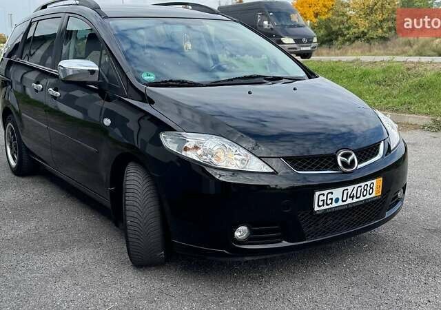 Черный Мазда 5, объемом двигателя 2 л и пробегом 220 тыс. км за 6500 $, фото 66 на Automoto.ua