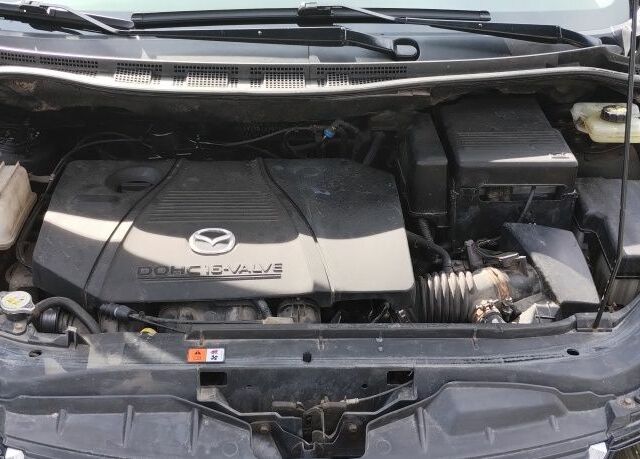 Чорний Мазда 5, об'ємом двигуна 1.8 л та пробігом 250 тис. км за 5350 $, фото 3 на Automoto.ua