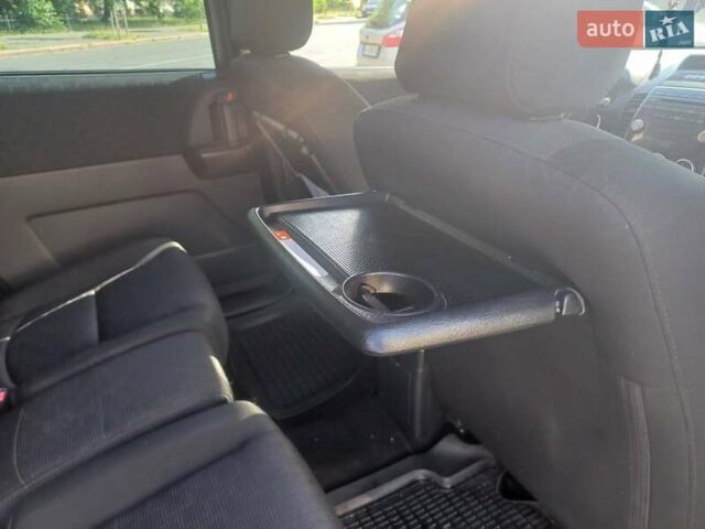 Черный Мазда 5, объемом двигателя 2 л и пробегом 245 тыс. км за 4600 $, фото 1 на Automoto.ua