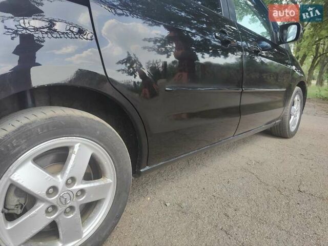 Черный Мазда 5, объемом двигателя 2 л и пробегом 227 тыс. км за 5200 $, фото 7 на Automoto.ua