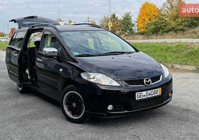 Черный Мазда 5, объемом двигателя 2 л и пробегом 220 тыс. км за 6500 $, фото 30 на Automoto.ua