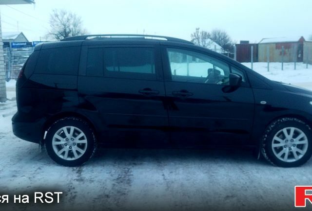 Черный Мазда 5, объемом двигателя 2 л и пробегом 247 тыс. км за 5199 $, фото 4 на Automoto.ua