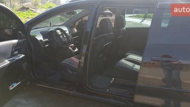 Черный Мазда 5, объемом двигателя 2 л и пробегом 298 тыс. км за 7000 $, фото 9 на Automoto.ua