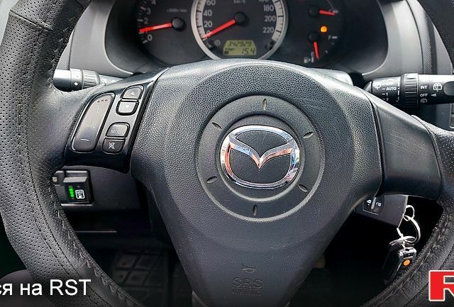 Черный Мазда 5, объемом двигателя 2 л и пробегом 350 тыс. км за 5000 $, фото 3 на Automoto.ua