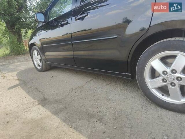 Черный Мазда 5, объемом двигателя 2 л и пробегом 227 тыс. км за 5200 $, фото 11 на Automoto.ua