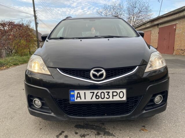 Черный Мазда 5, объемом двигателя 2 л и пробегом 230 тыс. км за 5500 $, фото 1 на Automoto.ua