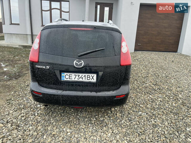 Чорний Мазда 5, об'ємом двигуна 2 л та пробігом 245 тис. км за 5500 $, фото 31 на Automoto.ua