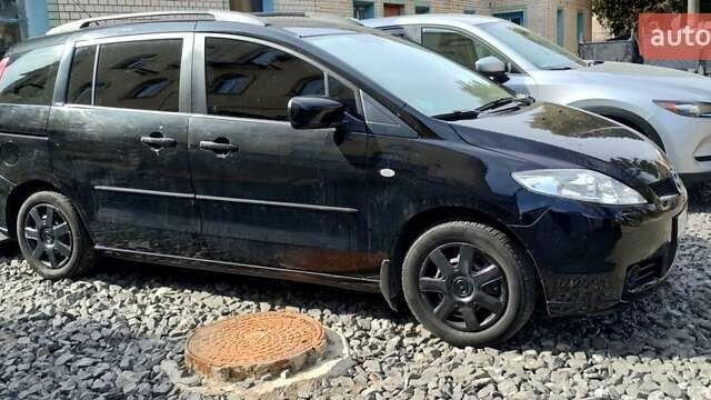 Черный Мазда 5, объемом двигателя 1.8 л и пробегом 250 тыс. км за 5400 $, фото 3 на Automoto.ua