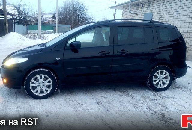 Черный Мазда 5, объемом двигателя 2 л и пробегом 247 тыс. км за 5199 $, фото 3 на Automoto.ua