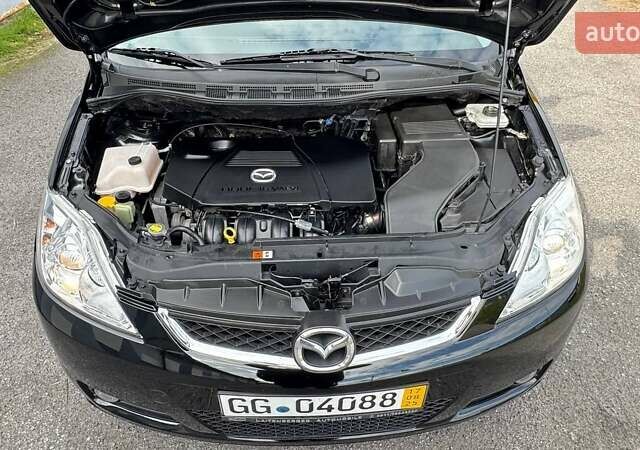Черный Мазда 5, объемом двигателя 2 л и пробегом 220 тыс. км за 6500 $, фото 36 на Automoto.ua