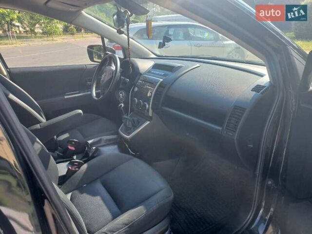 Черный Мазда 5, объемом двигателя 2 л и пробегом 245 тыс. км за 4600 $, фото 4 на Automoto.ua