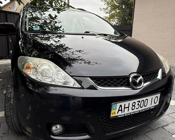 Черный Мазда 5, объемом двигателя 2 л и пробегом 228 тыс. км за 5100 $, фото 2 на Automoto.ua