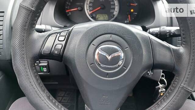 Черный Мазда 5, объемом двигателя 2 л и пробегом 360 тыс. км за 4700 $, фото 5 на Automoto.ua