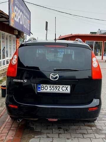 Черный Мазда 5, объемом двигателя 2 л и пробегом 360 тыс. км за 4700 $, фото 1 на Automoto.ua