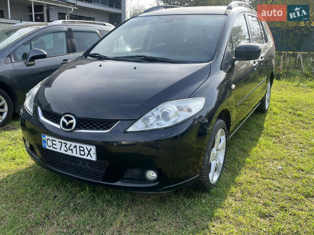 Черный Мазда 5, объемом двигателя 2 л и пробегом 244 тыс. км за 5500 $, фото 1 на Automoto.ua
