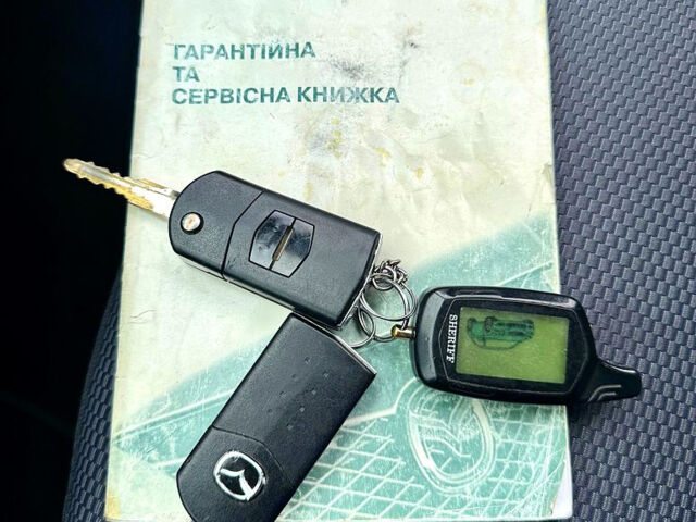 Черный Мазда 5, объемом двигателя 2 л и пробегом 289 тыс. км за 4450 $, фото 8 на Automoto.ua