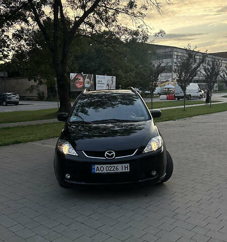 Черный Мазда 5, объемом двигателя 2 л и пробегом 221 тыс. км за 6800 $, фото 3 на Automoto.ua