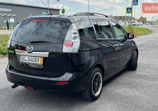 Черный Мазда 5, объемом двигателя 2 л и пробегом 220 тыс. км за 6500 $, фото 49 на Automoto.ua