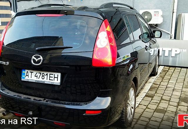 Черный Мазда 5, объемом двигателя 18 л и пробегом 200 тыс. км за 5600 $, фото 1 на Automoto.ua