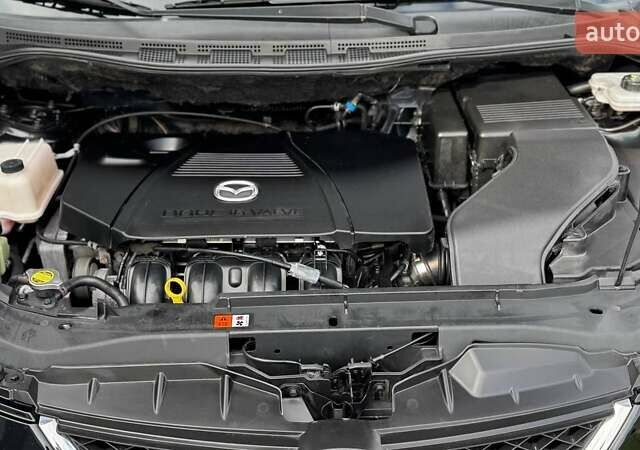 Черный Мазда 5, объемом двигателя 2 л и пробегом 220 тыс. км за 6500 $, фото 26 на Automoto.ua