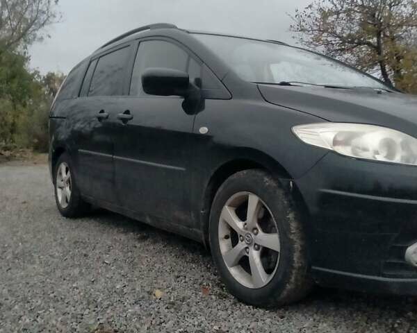 Черный Мазда 5, объемом двигателя 2 л и пробегом 245 тыс. км за 4600 $, фото 3 на Automoto.ua