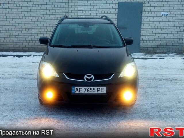 Черный Мазда 5, объемом двигателя 2 л и пробегом 247 тыс. км за 5199 $, фото 1 на Automoto.ua