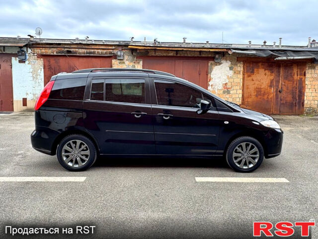 Черный Мазда 5, объемом двигателя 2 л и пробегом 289 тыс. км за 4450 $, фото 5 на Automoto.ua